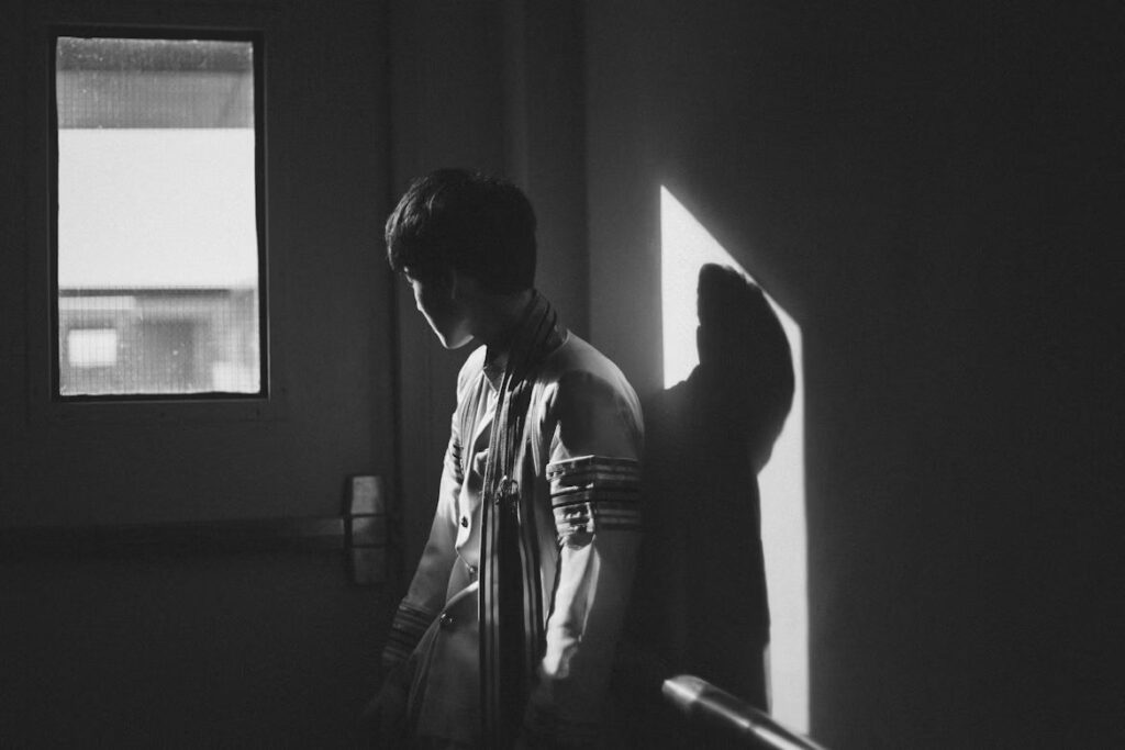 Person Staring Out A Window